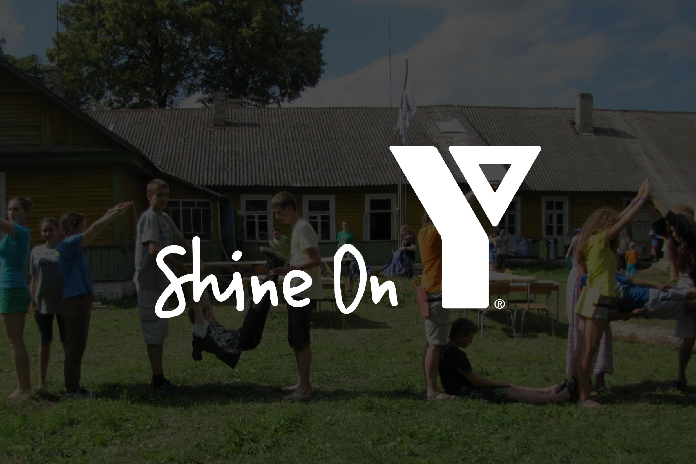 Children and teens participating in outdoor group activities at a YMCA camp with the Shine On logo overlayed.